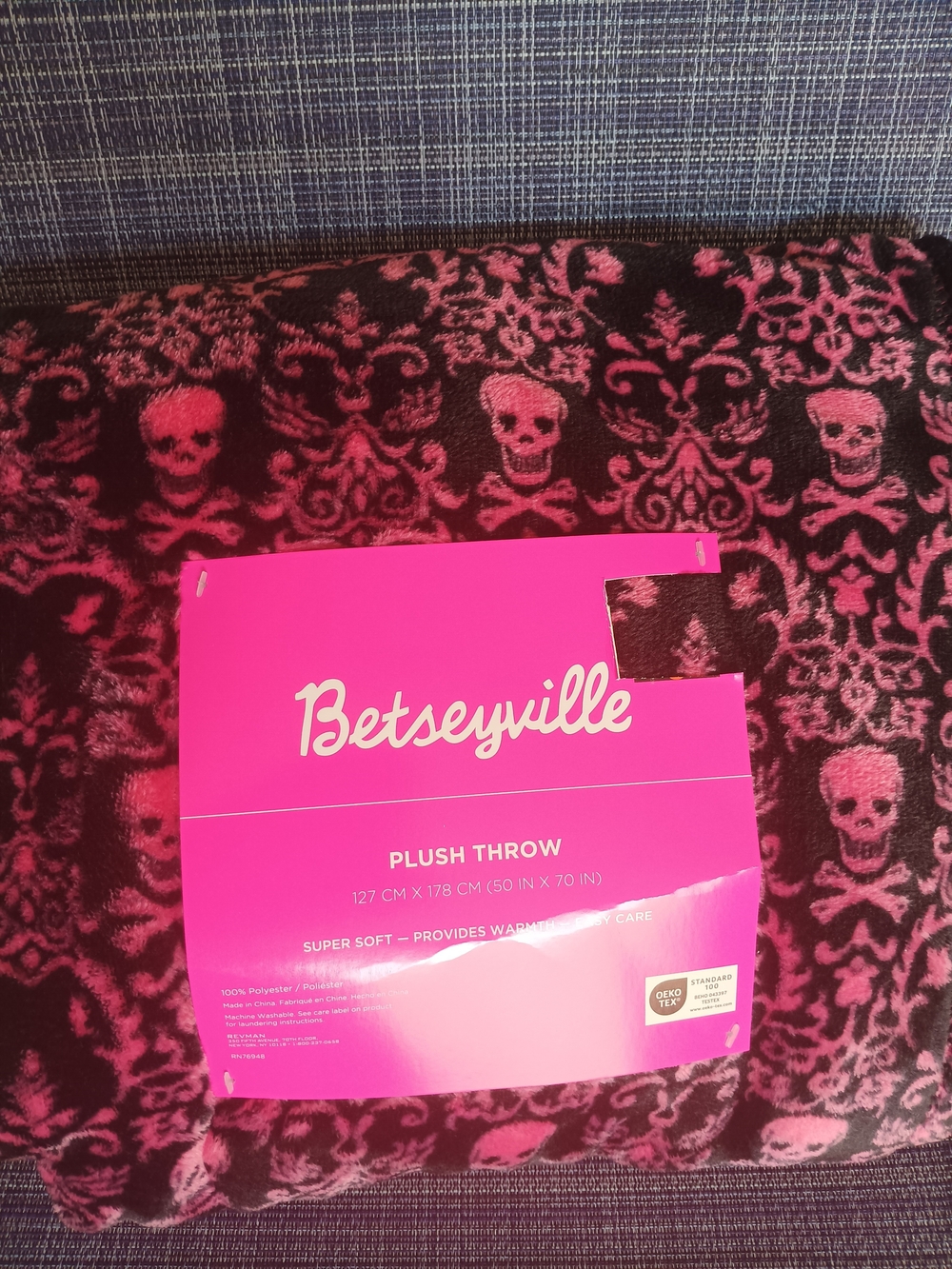 Betsey Johnson pink and black skull damask plush throw
